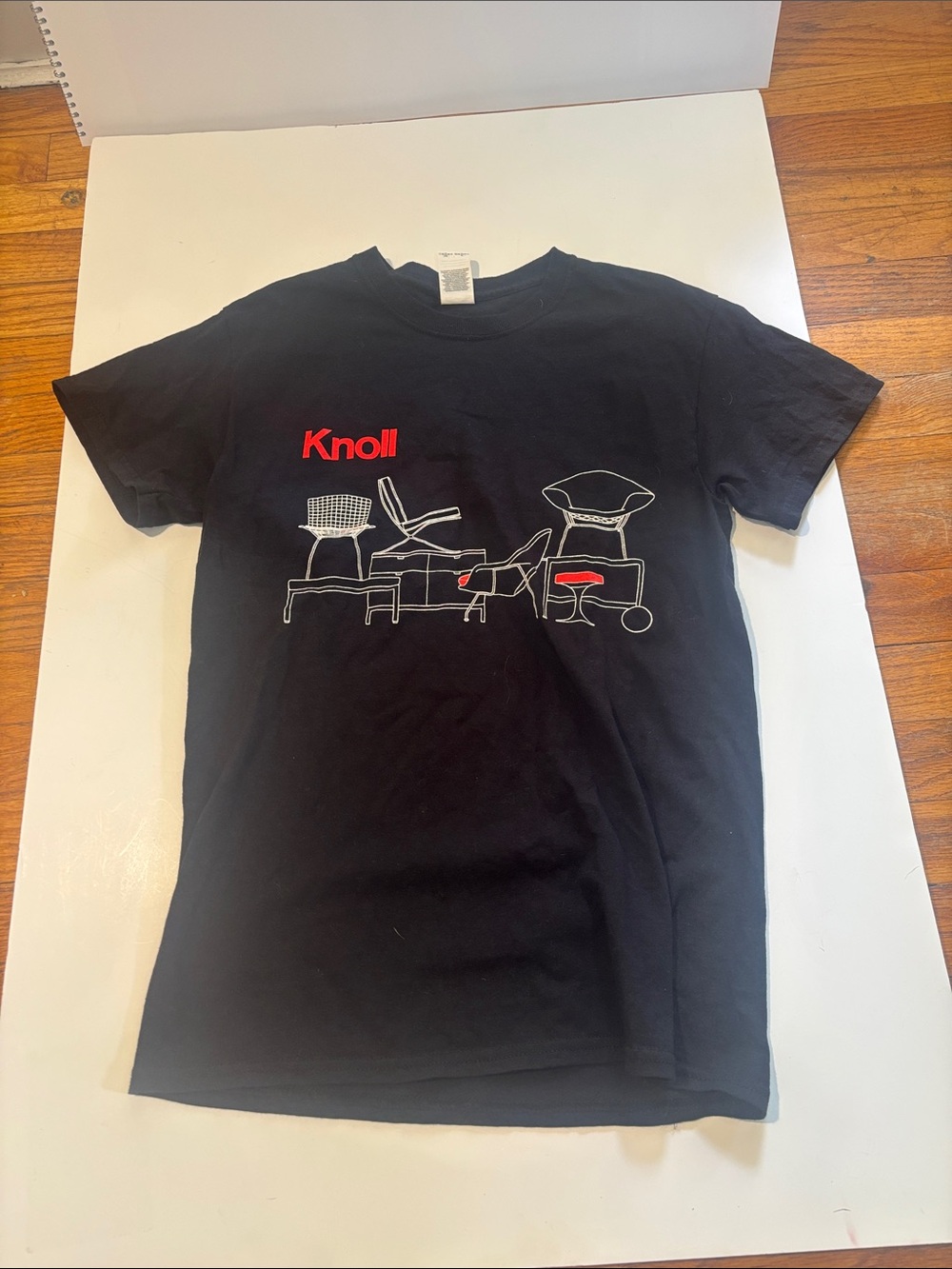 Knoll Design Black Tee with White Chair Line Art and Red Logo